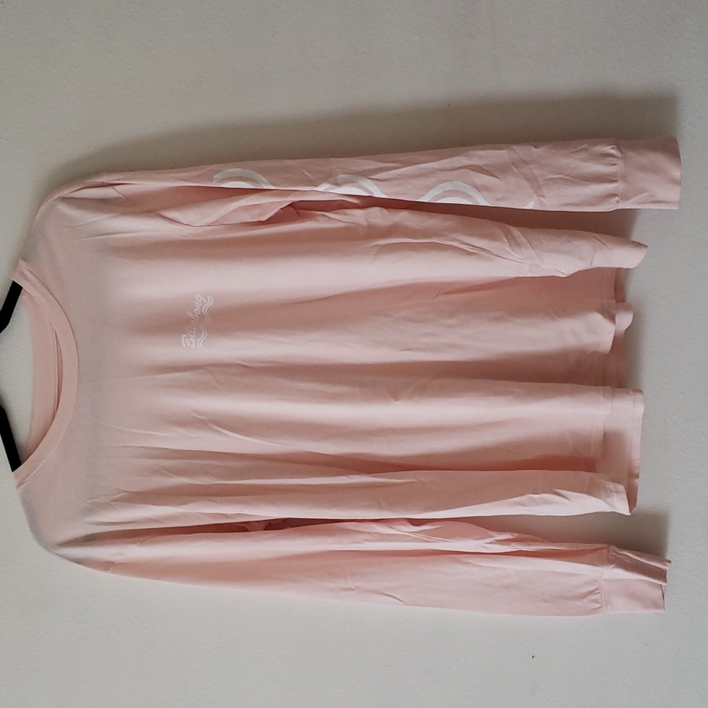 Long Sleeved Billabong Tee. Pink with white graphics.